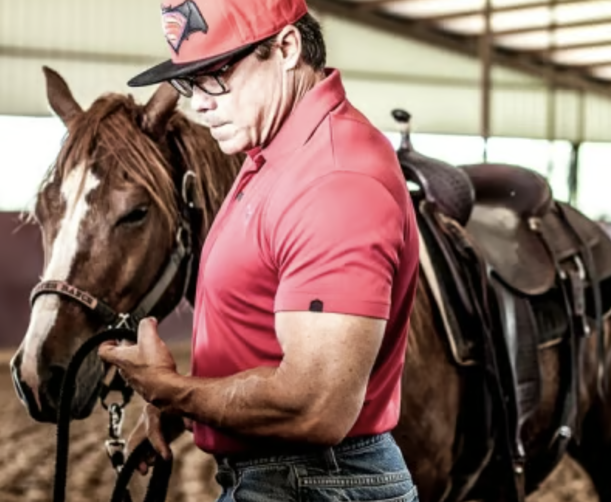 Reagan Lancaster with cutting horse at Lancaster Ranch arena